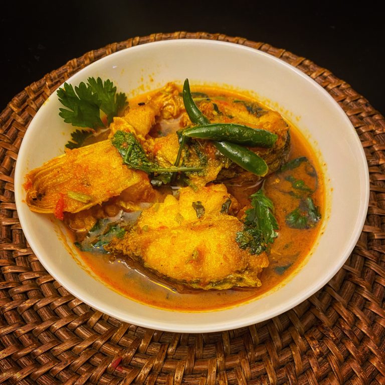 Striped Bass Fish in Bengali style curry Flavors & Places